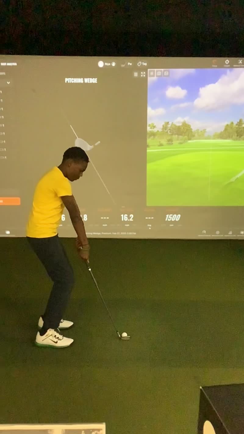 FFGF youth participant using golf simulator technology with real-time launch data and virtual course play